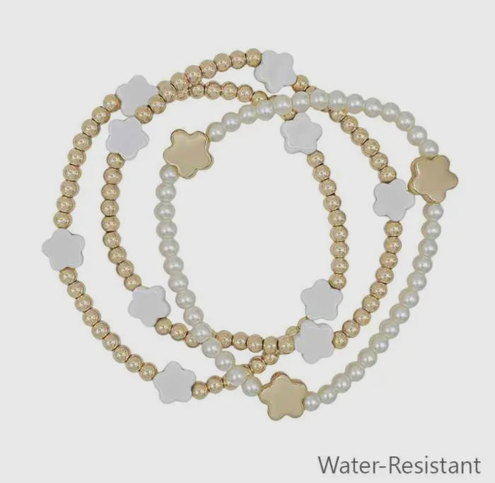 Gold Beaded and Pearl with White Flower Set of 3
Stretch Bracelets