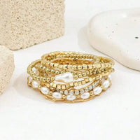 Set of Eight Mixed Gold Bracelets