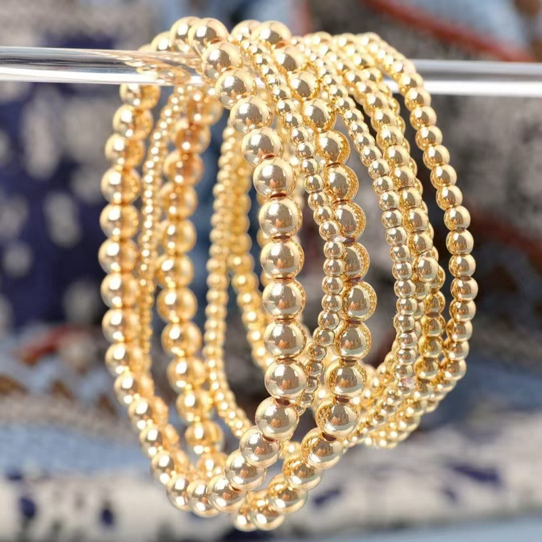Set of Seven Gold Beaded Bracelets