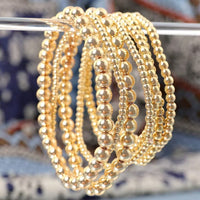 Set of Seven Gold Beaded Bracelets