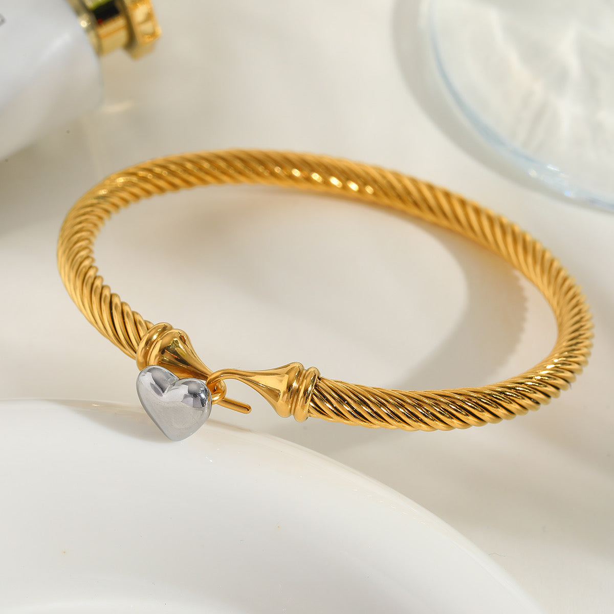 Gold Twist Bracelet with Silver Heart