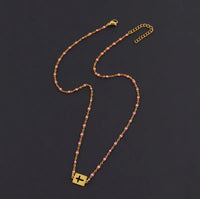 Enamel Bead Sideways Cross Necklace