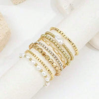 Set of Eight Mixed Gold Bracelets