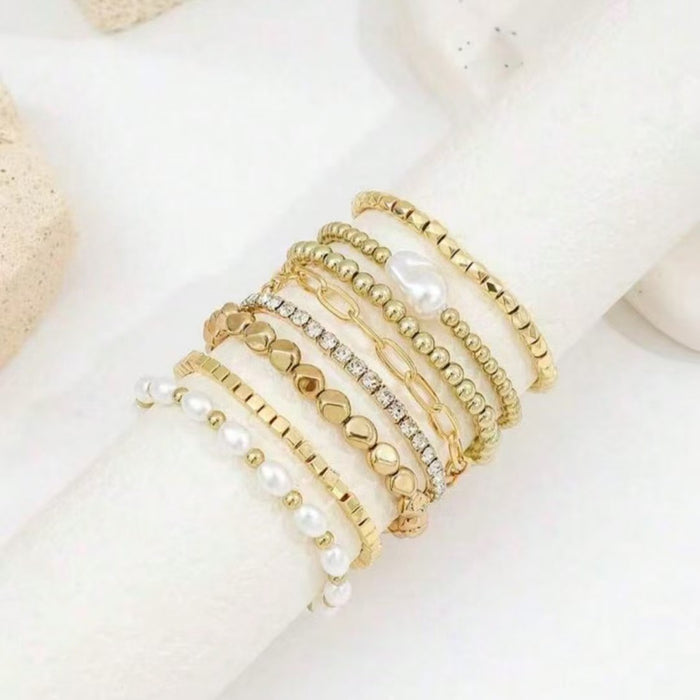 Set of Eight Mixed Gold Bracelets