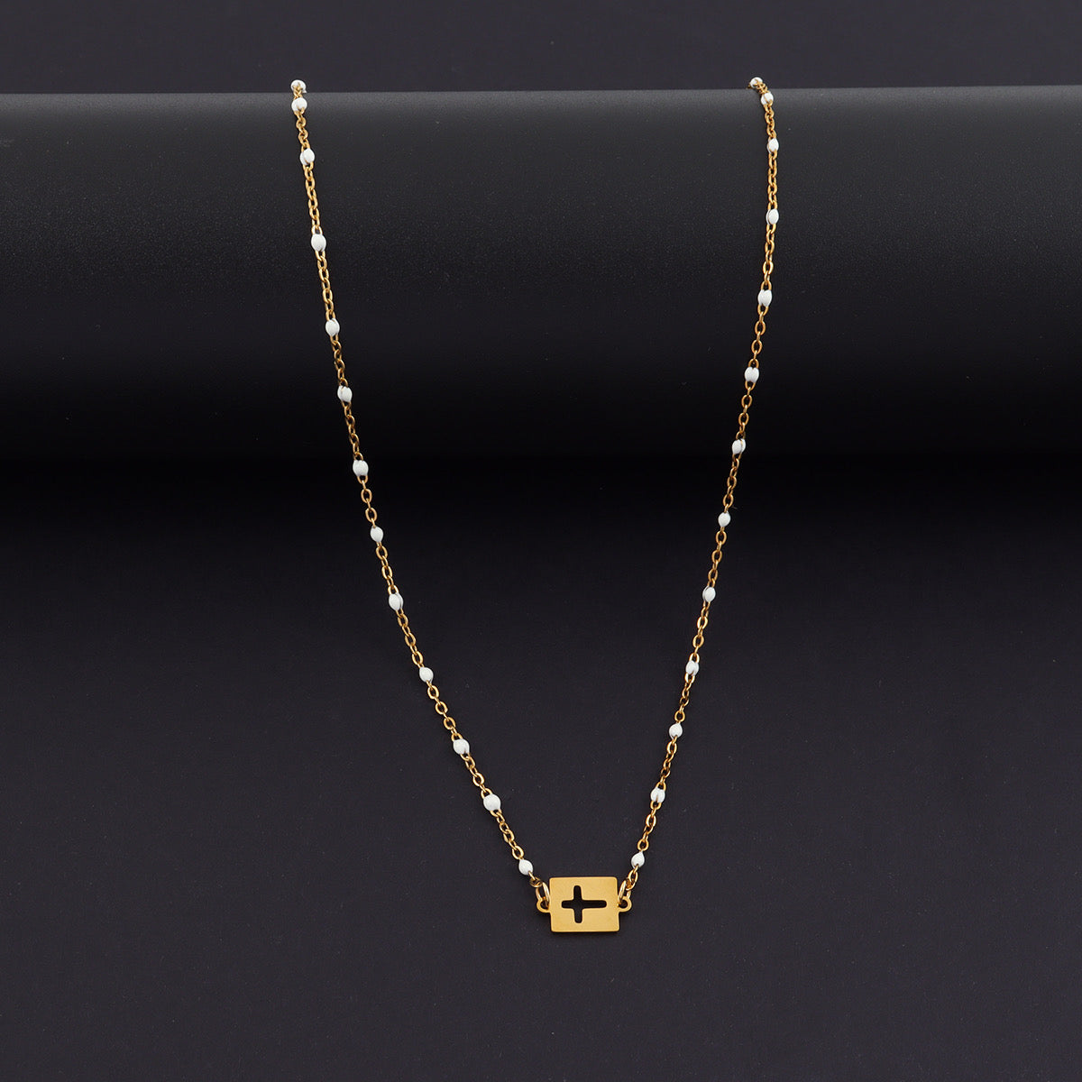 White Bead Sideways Cross Necklace