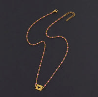 Enamel Bead Sideways Cross Necklace